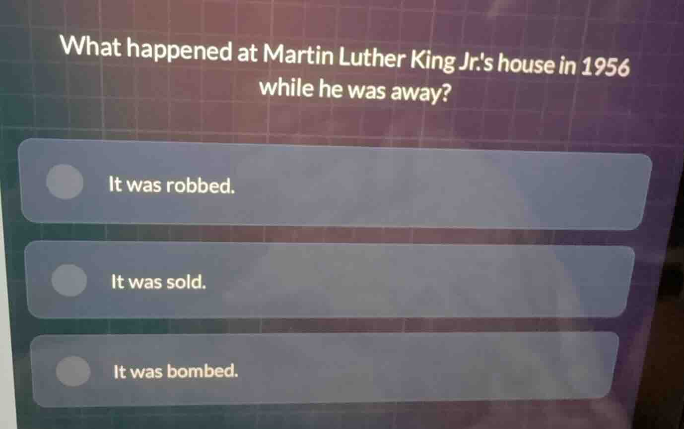 what happened at martin luther king jr.s house in 1956 while he was awa…