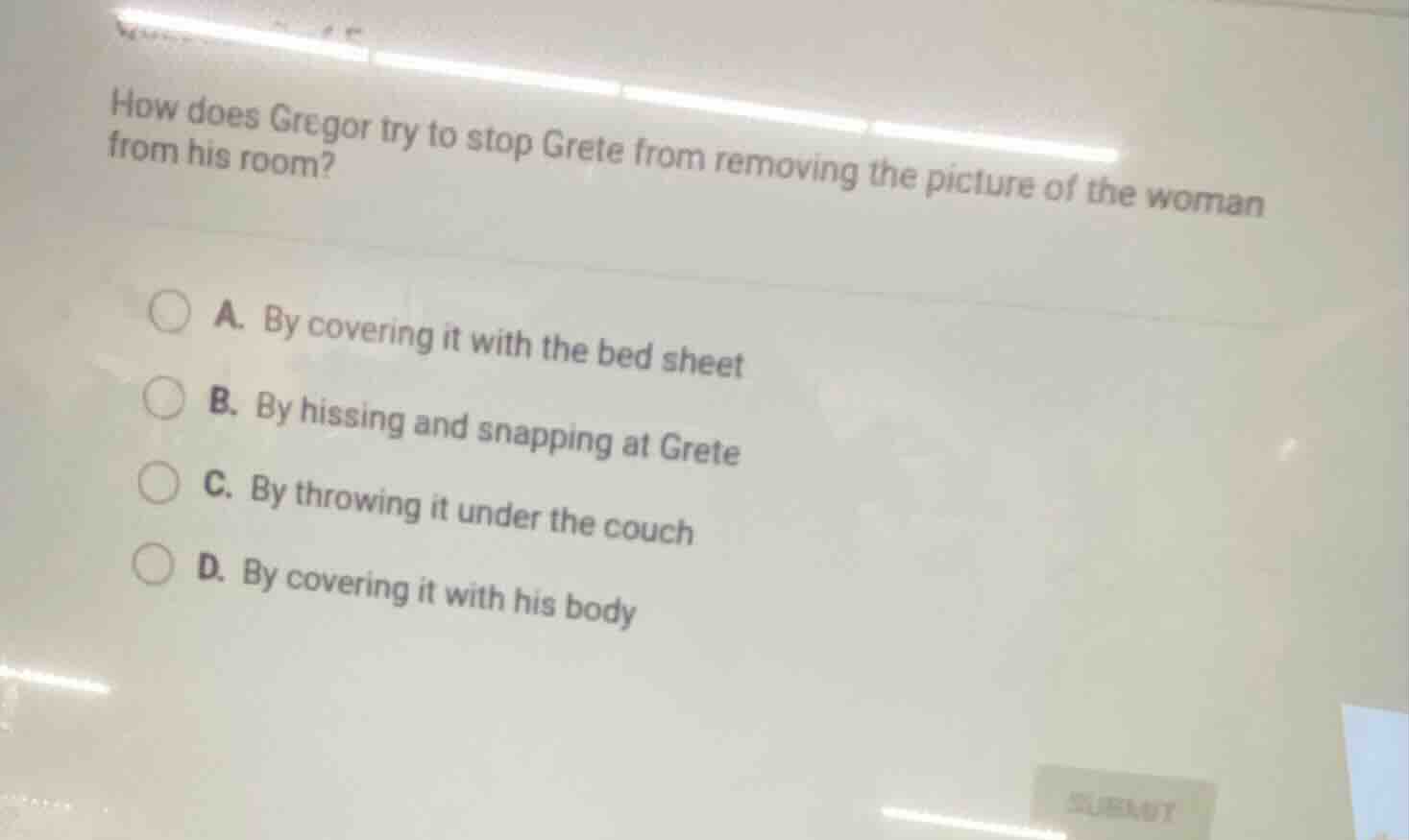 how does gregor try to stop grete from removing the picture of the woma…