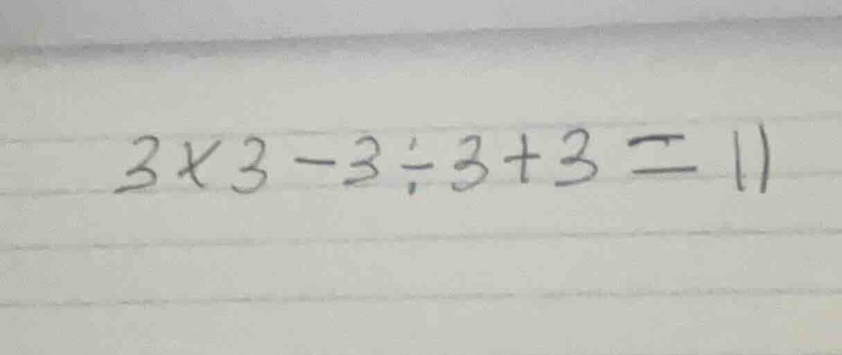 \\3 \\times 3 - 3 \\div 3 + 3 = 11\\
