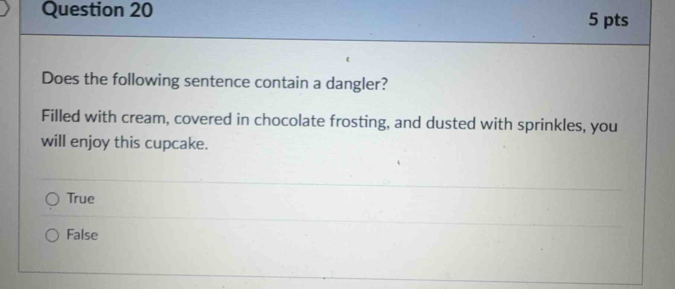 does the following sentence contain a dangler? filled with cream, cover…