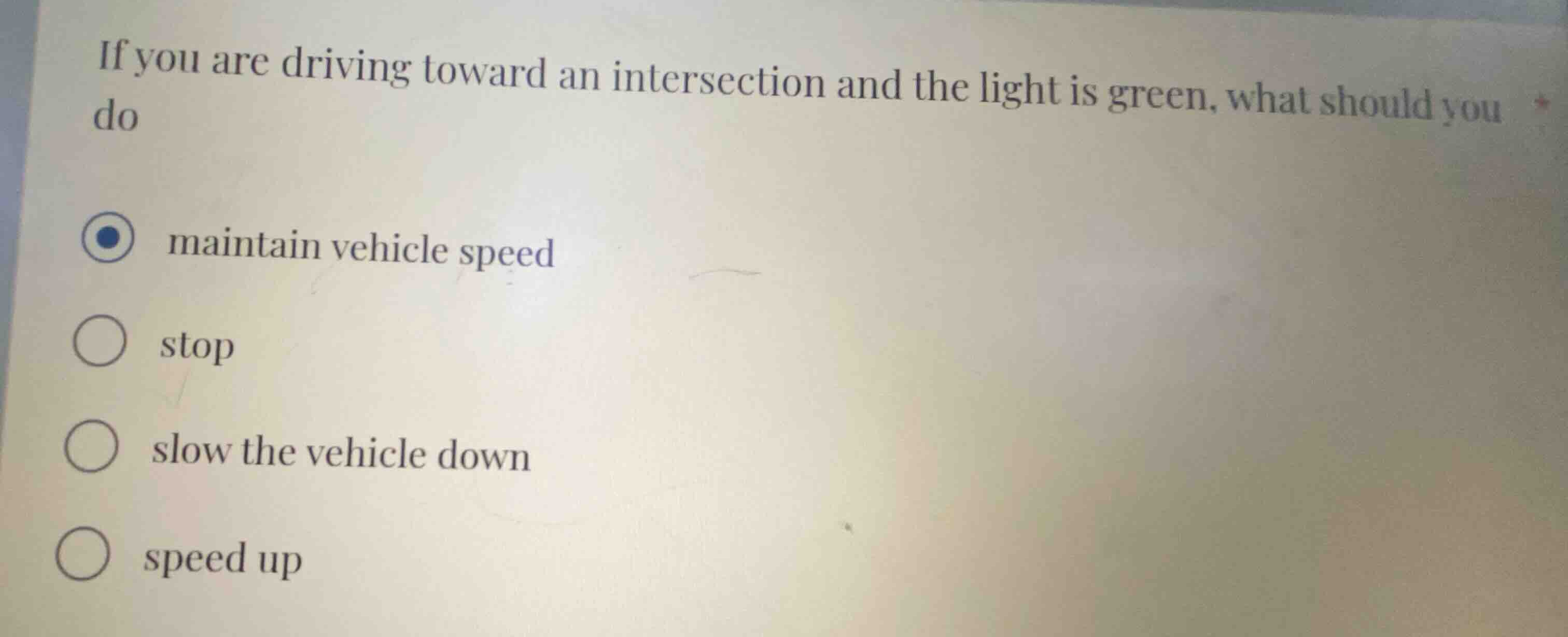 if you are driving toward an intersection and the light is green, what …