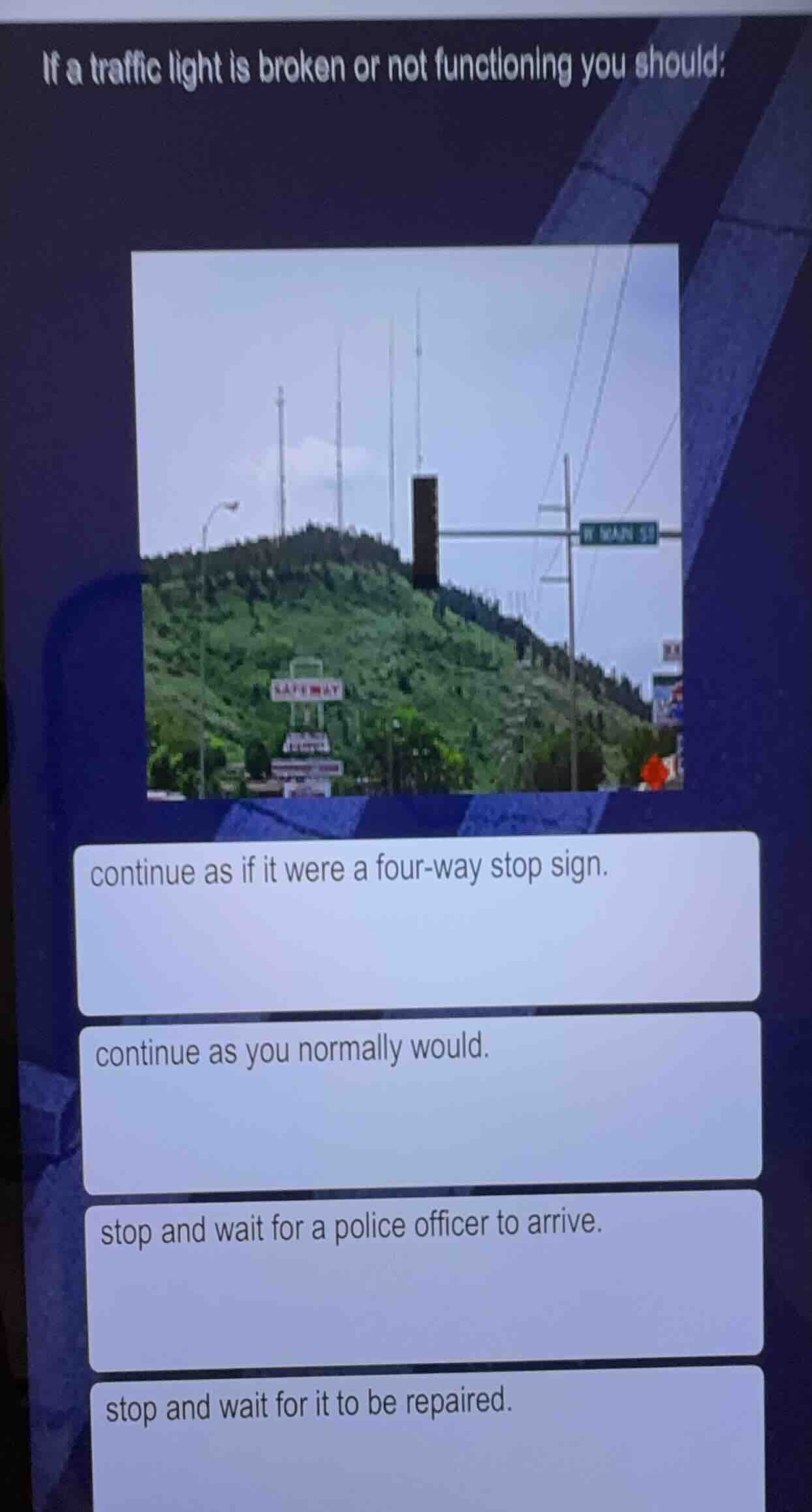 if a traffic light is broken or not functioning you should: continue as…