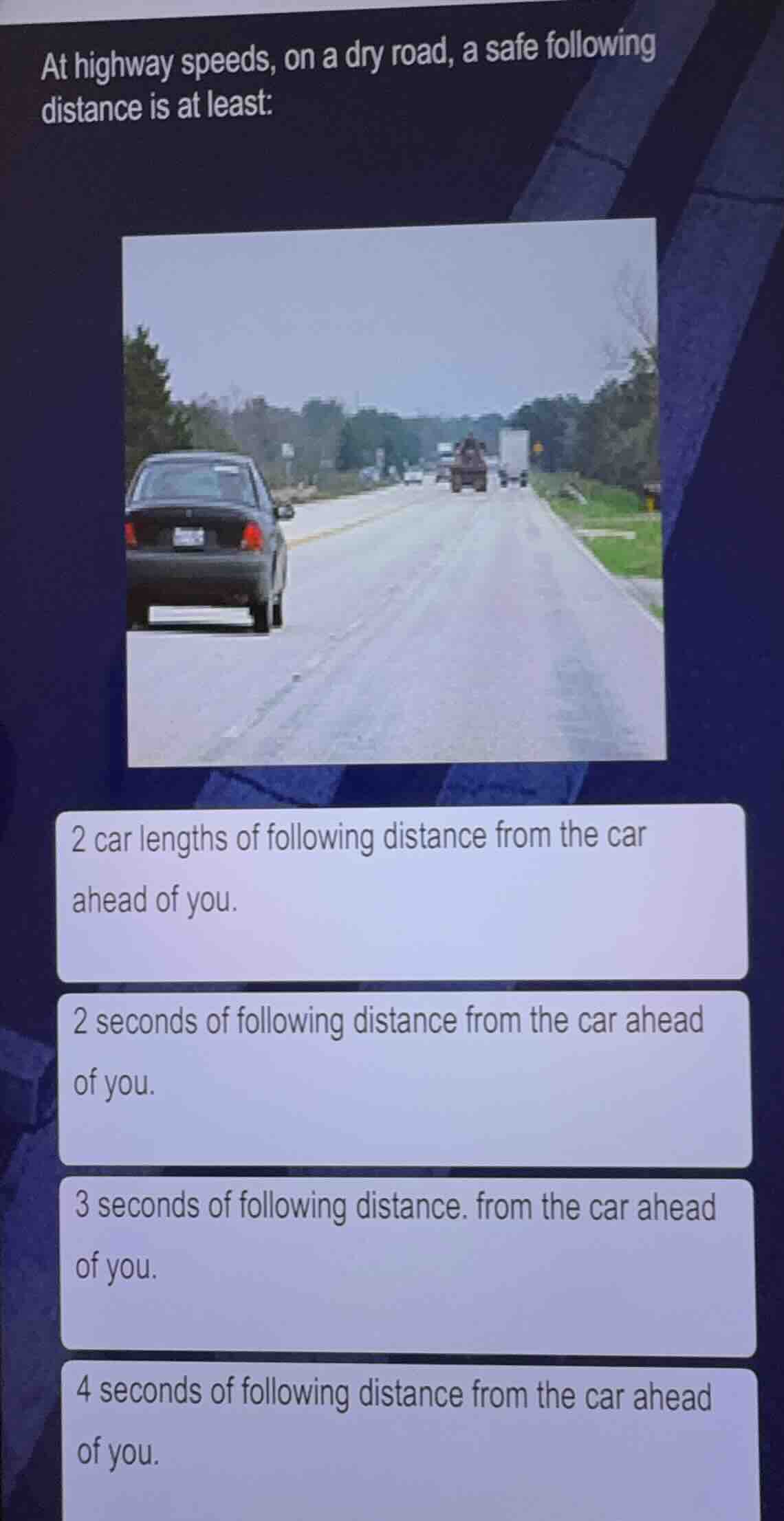 at highway speeds, on a dry road, a safe following distance is at least…