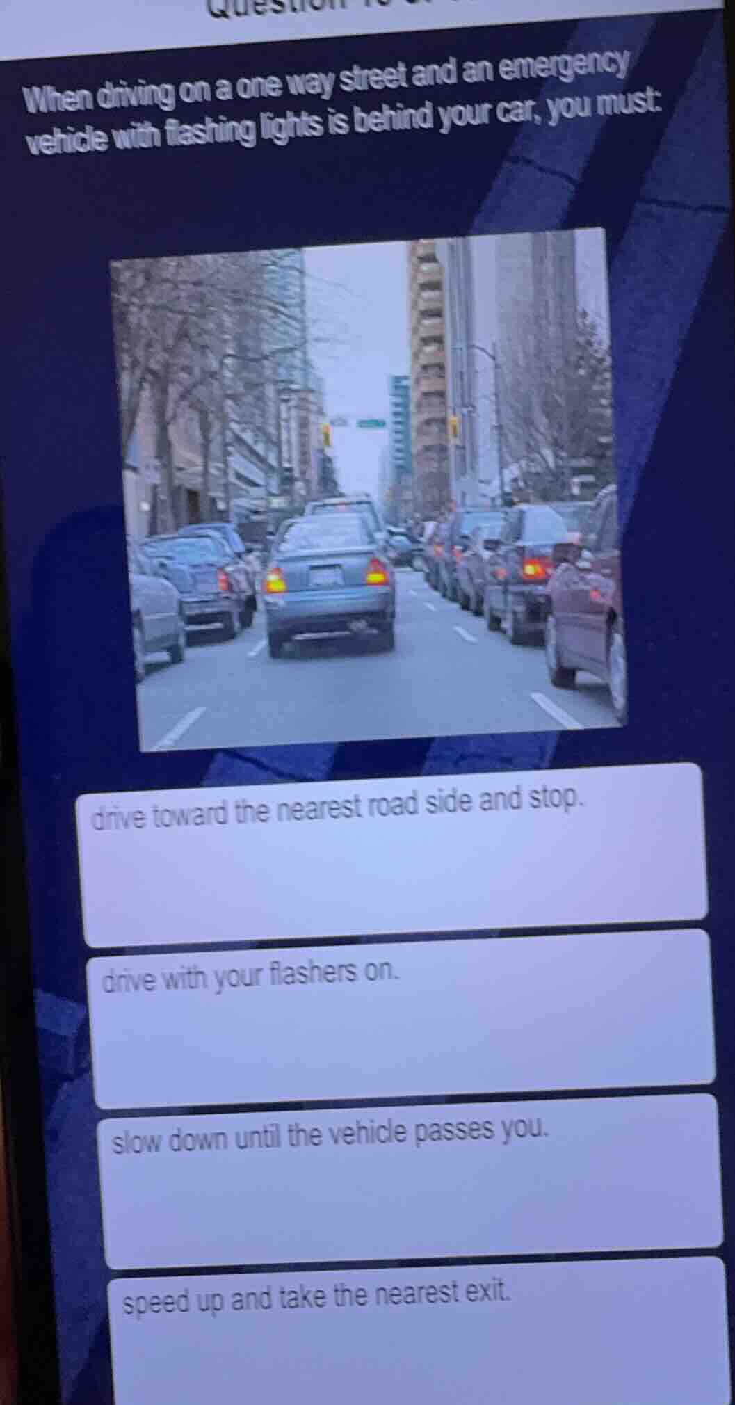 when driving on a one way street and an emergency vehicle with flashing…