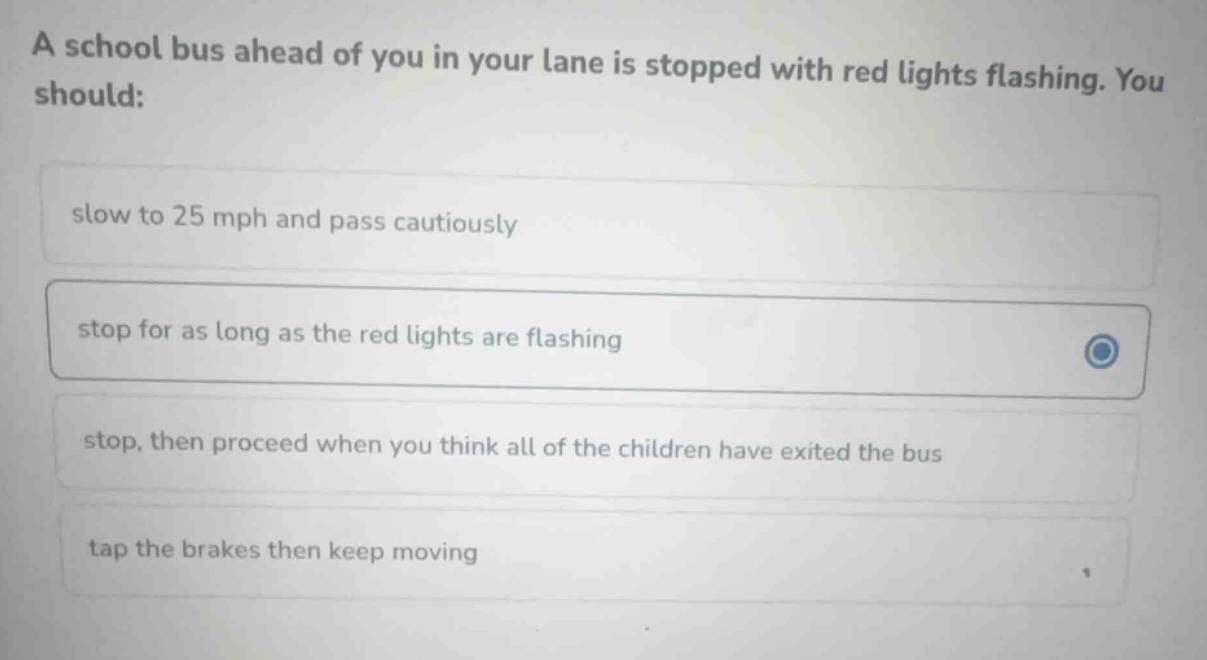 a school bus ahead of you in your lane is stopped with red lights flash…