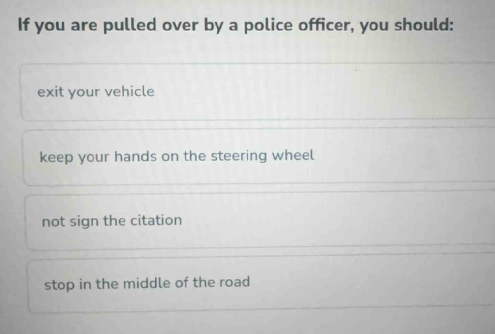 if you are pulled over by a police officer, you should: exit your vehic…