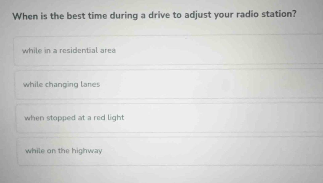 when is the best time during a drive to adjust your radio station? whil…