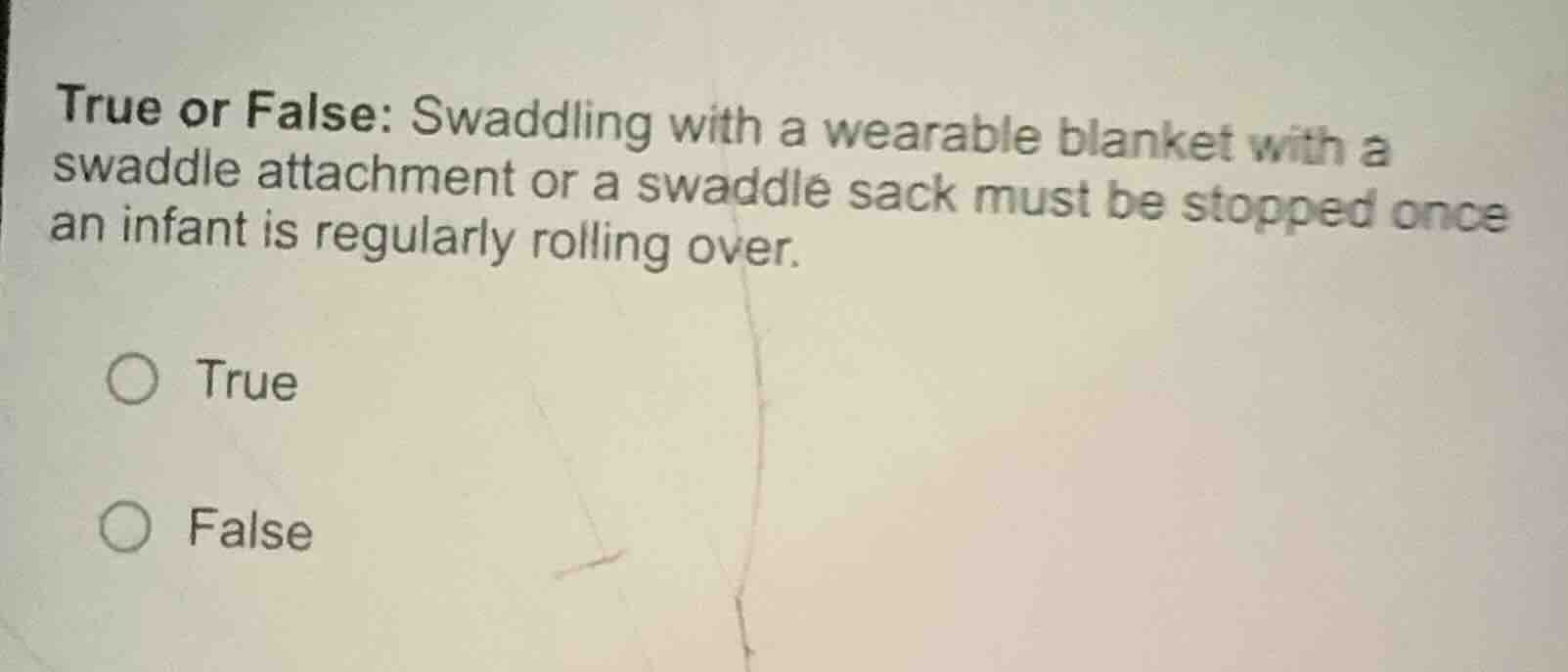 true or false: swaddling with a wearable blanket with a swaddle attachm…