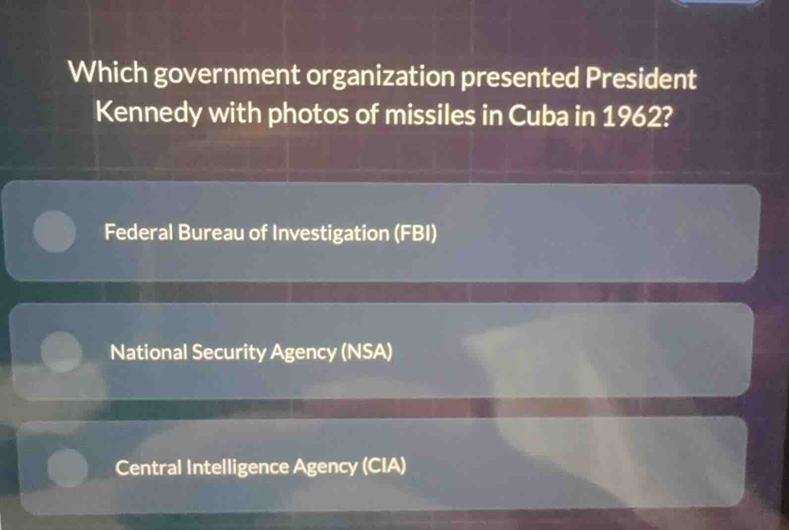 which government organization presented president kennedy with photos o…