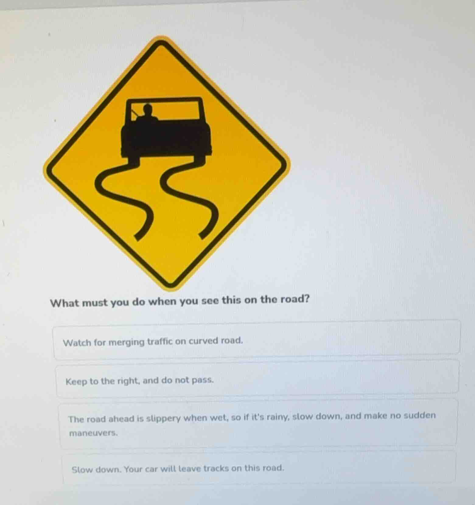 what must you do when you see this on the road? watch for merging traff…