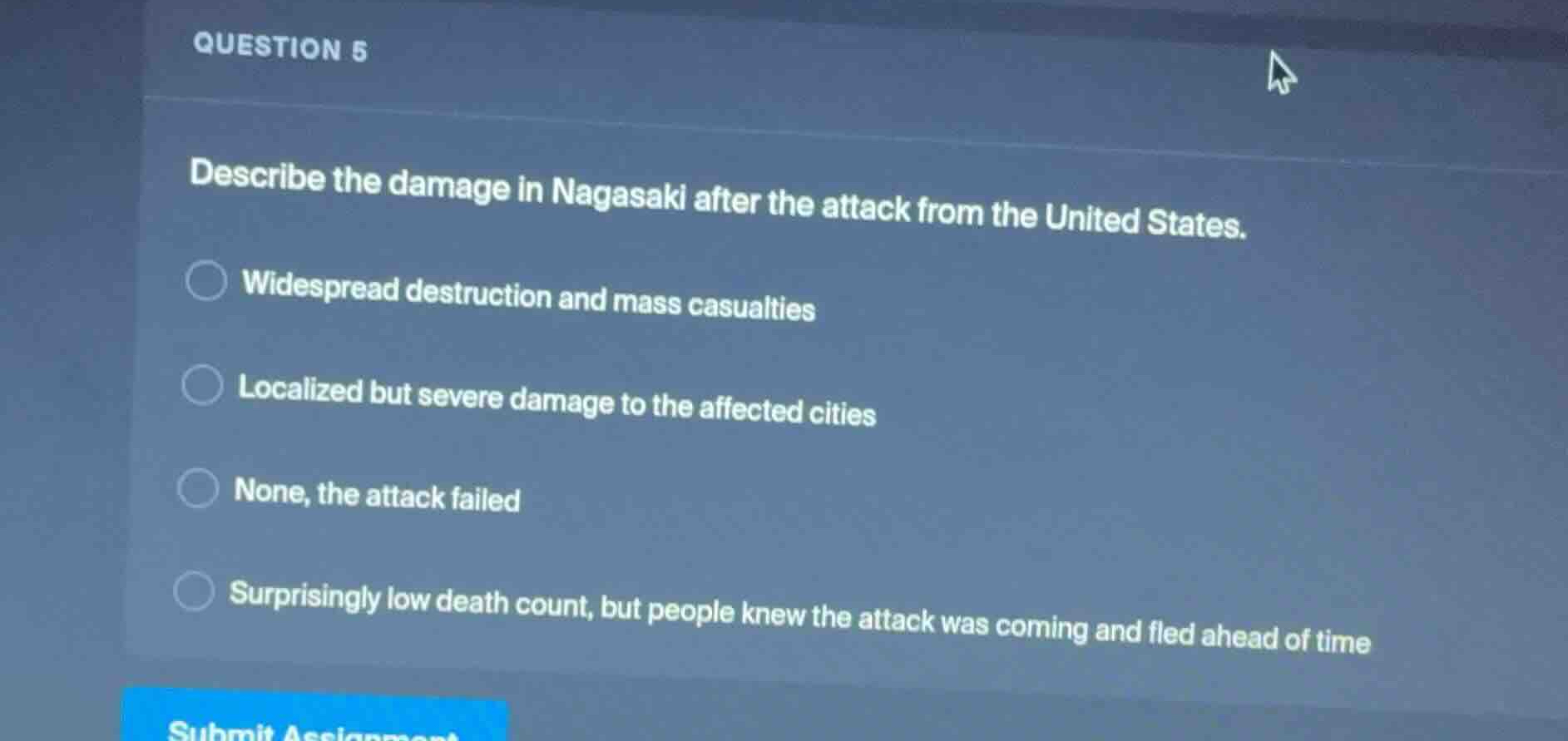 question 5 describe the damage in nagasaki after the attack from the un…